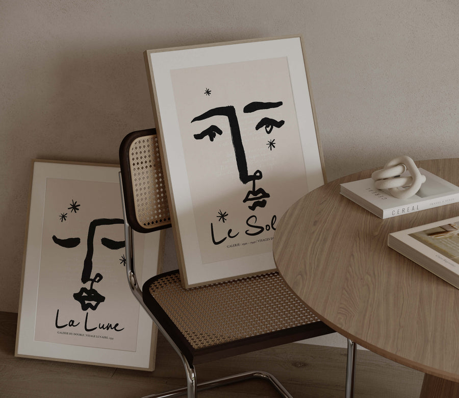 Abstract line art face with closed eyes in black ink. Poetic and feminine moon-themed wall art print with French quote overlay.