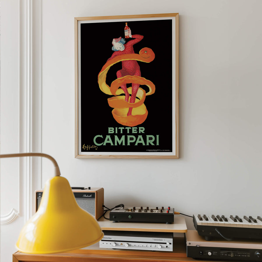 Bitter Campari print by Leonetto Cappiello in classic Art Nouveau style, featuring bold red tones, a striking central figure, and vintage charm. Perfect for lovers of retro decor and classic advertising art