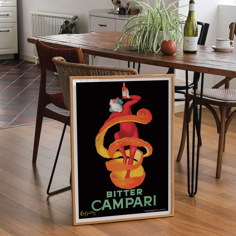 Bitter Campari print by Leonetto Cappiello in classic Art Nouveau style, featuring bold red tones, a striking central figure, and vintage charm. Perfect for lovers of retro decor and classic advertising art