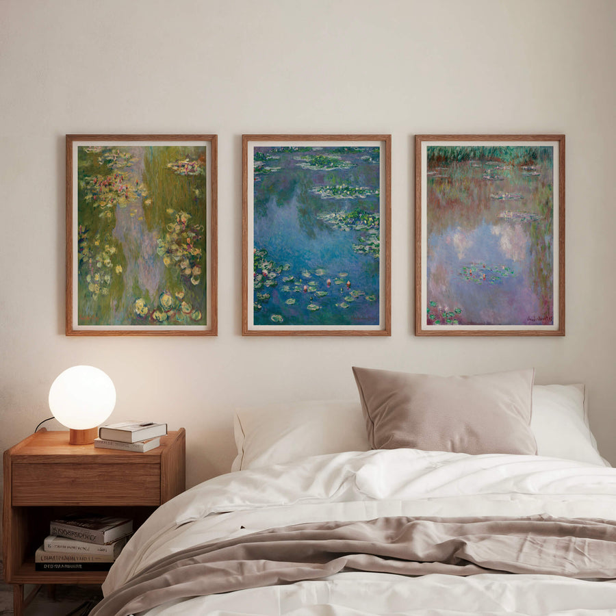 Bedroom scene with Claude Monet’s water lily trio prints framed above the bed – soft pastel wall art.