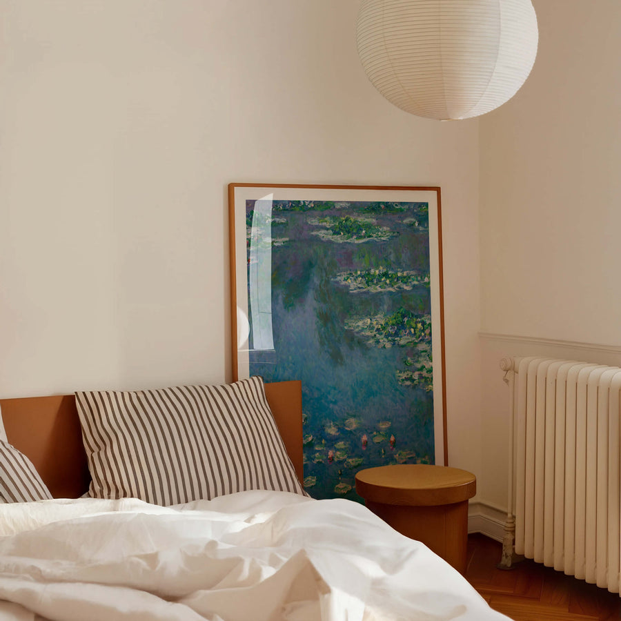 Water Lilies at Dusk painting by Claude Monet in soft blues and greens – dreamy landscape print on wall.