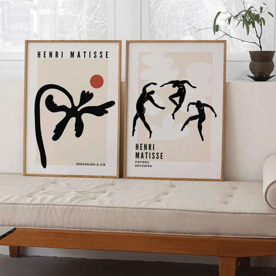 Matisse-inspired black abstract palm print featuring organic cut-out shapes with a terracotta sun on a neutral beige background. A modern and minimalist botanical wall art piece. Get 2PrintsFor$100 that comes with Free Shipping 🚚💫 in Australia.
