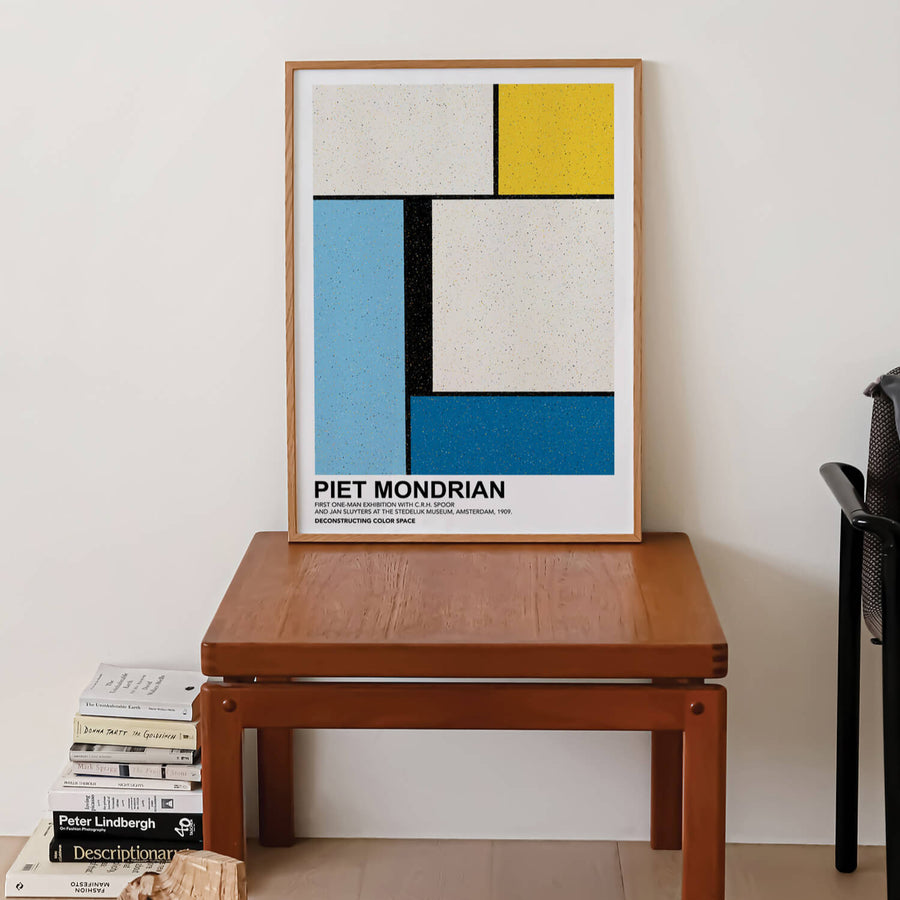 Mondrian-inspired Deconstructing Colour Space Print featuring bold geometric shapes in primary colors (red, blue, yellow) with black grid lines on a white background. A modern minimalist abstract wall art piece. Get 2PrintsFor$100 that comes with Free Shipping 🚚💫 in Australia.