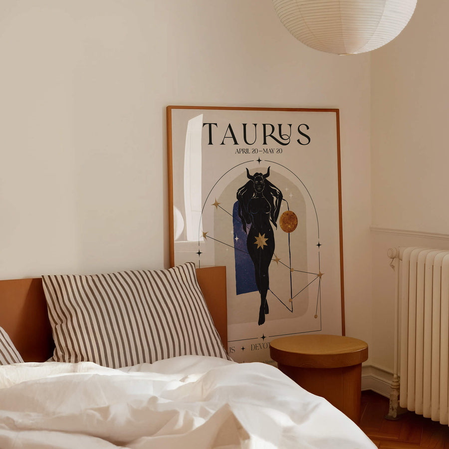 Taurus zodiac wall art print with a strong feminine figure, cosmic background, and golden horned crown – astrology decor by EDGE Wall Art Australia.