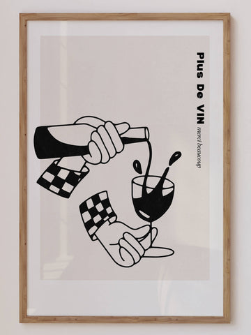 Framed black and white illustration of a hand pouring red wine into a glass with the text “More Wine Please” – bold kitchen wall art print from EDGE Wall Art
