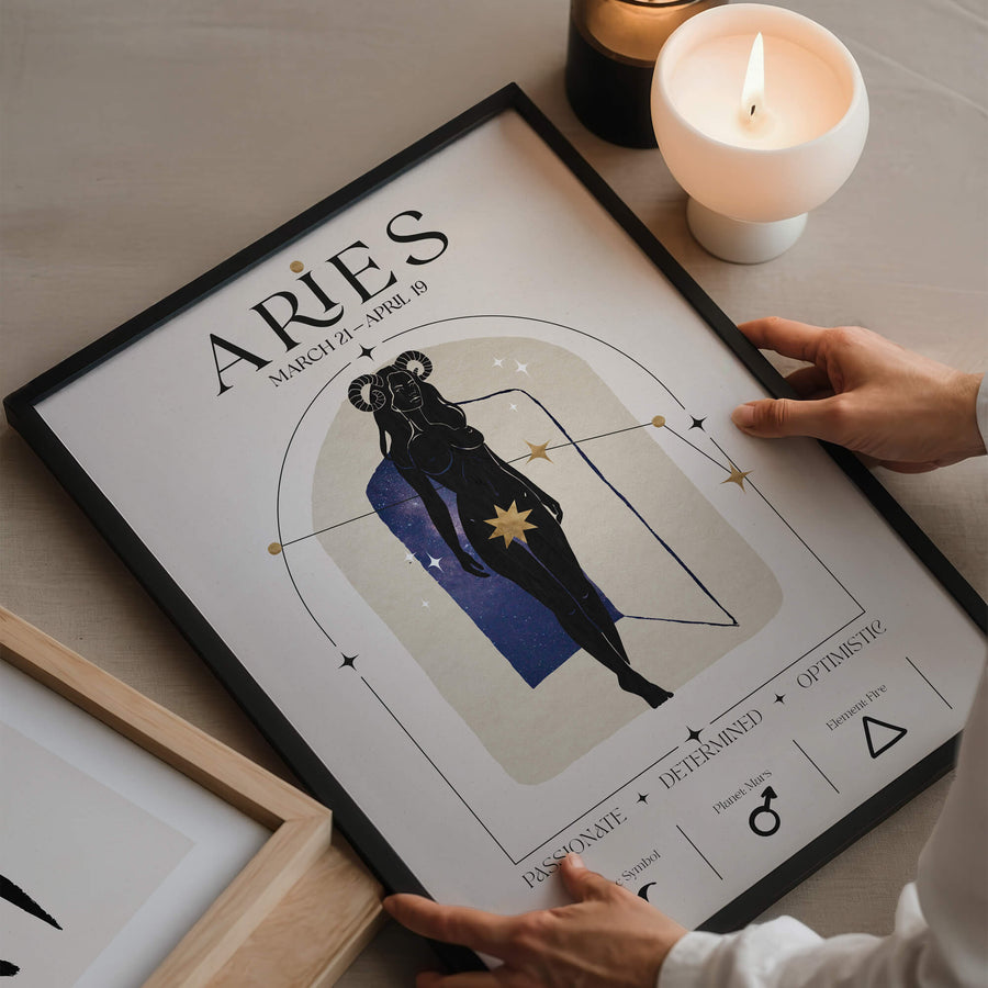 Aries zodiac wall art print with a fierce feminine figure wearing ram horns and surrounded by golden stars – astrology decor by EDGE Wall Art Australia.
