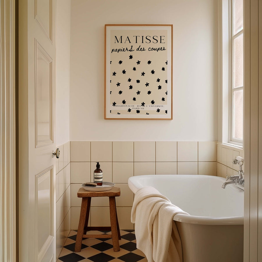 Matisse-inspired Stars Print featuring black floral cut-out shapes scattered on a neutral beige background. A minimalist and elegant botanical wall art piece. Get 2PrintsFor$100 that comes with Free Shipping 🚚💫 in Australia.
