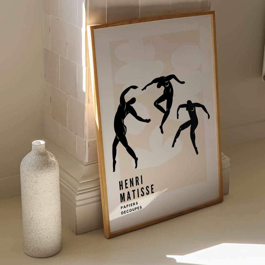 Matisse-inspired black and white abstract print featuring elegant dancing figures against a soft beige background. A minimalist and modern wall art piece. Get 2PrintsFor$100 that comes with Free Shipping 🚚💫 in Australia.