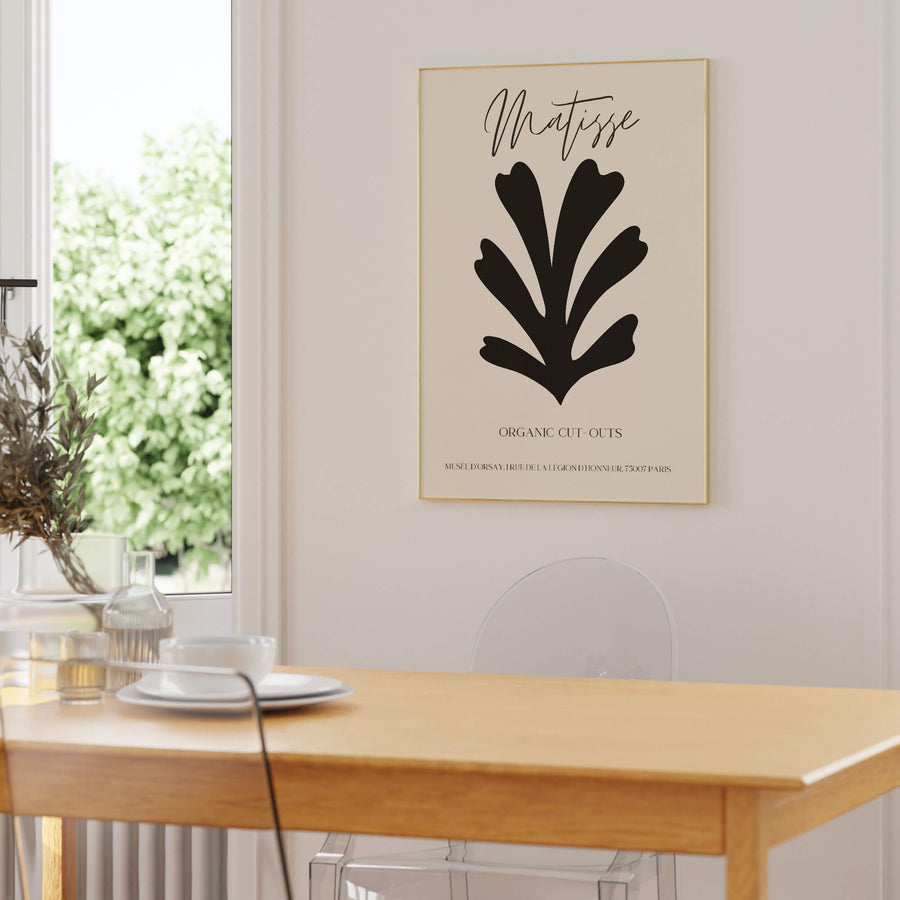 Matisse-inspired black organic cut-out print featuring bold abstract botanical shapes on a neutral background. A minimalist and modern wall art piece. Get 2PrintsFor$100 that comes with Free Shipping 🚚💫 in Australia.