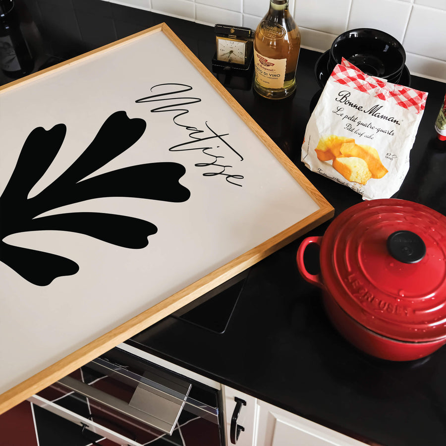 Matisse-inspired black organic cut-out print featuring bold abstract botanical shapes on a neutral background. A minimalist and modern wall art piece. Get 2PrintsFor$100 that comes with Free Shipping 🚚💫 in Australia.