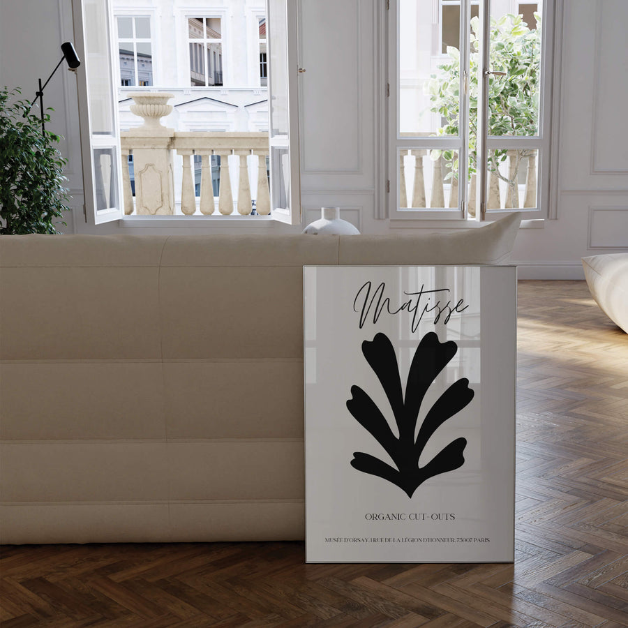 Matisse-inspired black organic cut-out print featuring bold abstract botanical shapes on a neutral background. A minimalist and modern wall art piece. Get 2PrintsFor$100 that comes with Free Shipping 🚚💫 in Australia.
