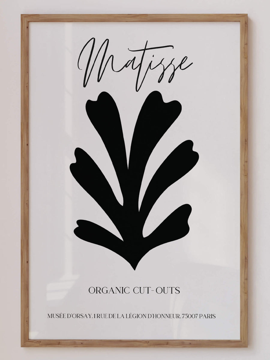 Matisse-inspired black organic cut-out print featuring bold abstract botanical shapes on a neutral background. A minimalist and modern wall art piece. Get 2PrintsFor$100 that comes with Free Shipping 🚚💫 in Australia.