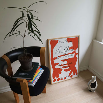 Le Chant des Morts Print by Pablo Picasso featuring bold red abstract brushstrokes and handwritten French text, framed in natural wood. Get 2PrintsFor$100 that comes with Free Shipping 🚚💫 in Australia.