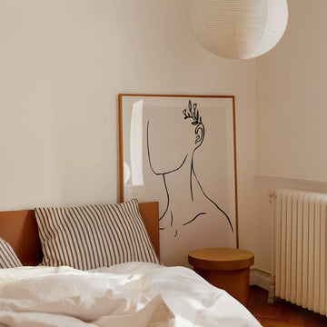 Etched in You – Minimalist faceless figure with growing flowers and handwritten text “Etched in You.” Poetic soulmate print for home decor.