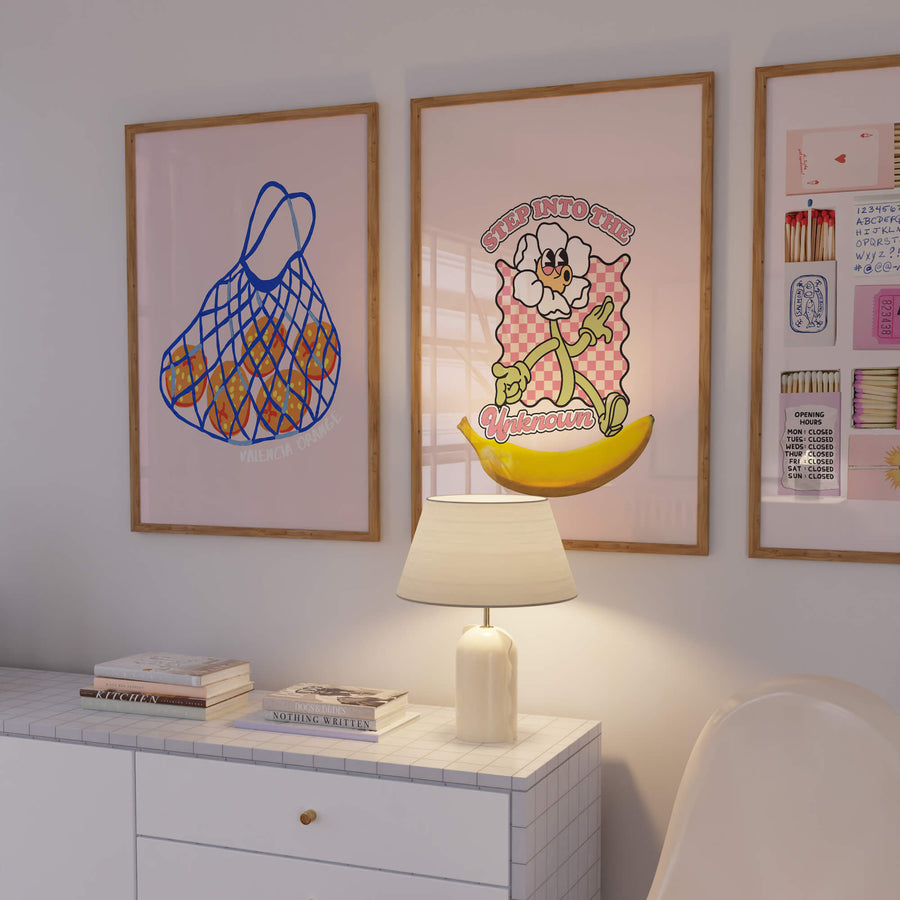 Illustrated Valencia oranges in a blue net bag on pink background – fruity retro kitchen wall art print. Get 2PrintsFor$100 + Free Shipping in Australia.