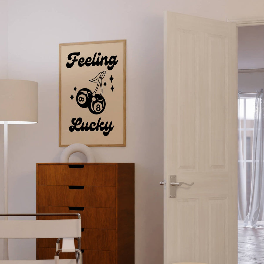 Black and white retro wall art print featuring cherry-shaped 8-balls and the phrase 